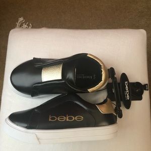 NTW Black and gold BeBe leather sneakers